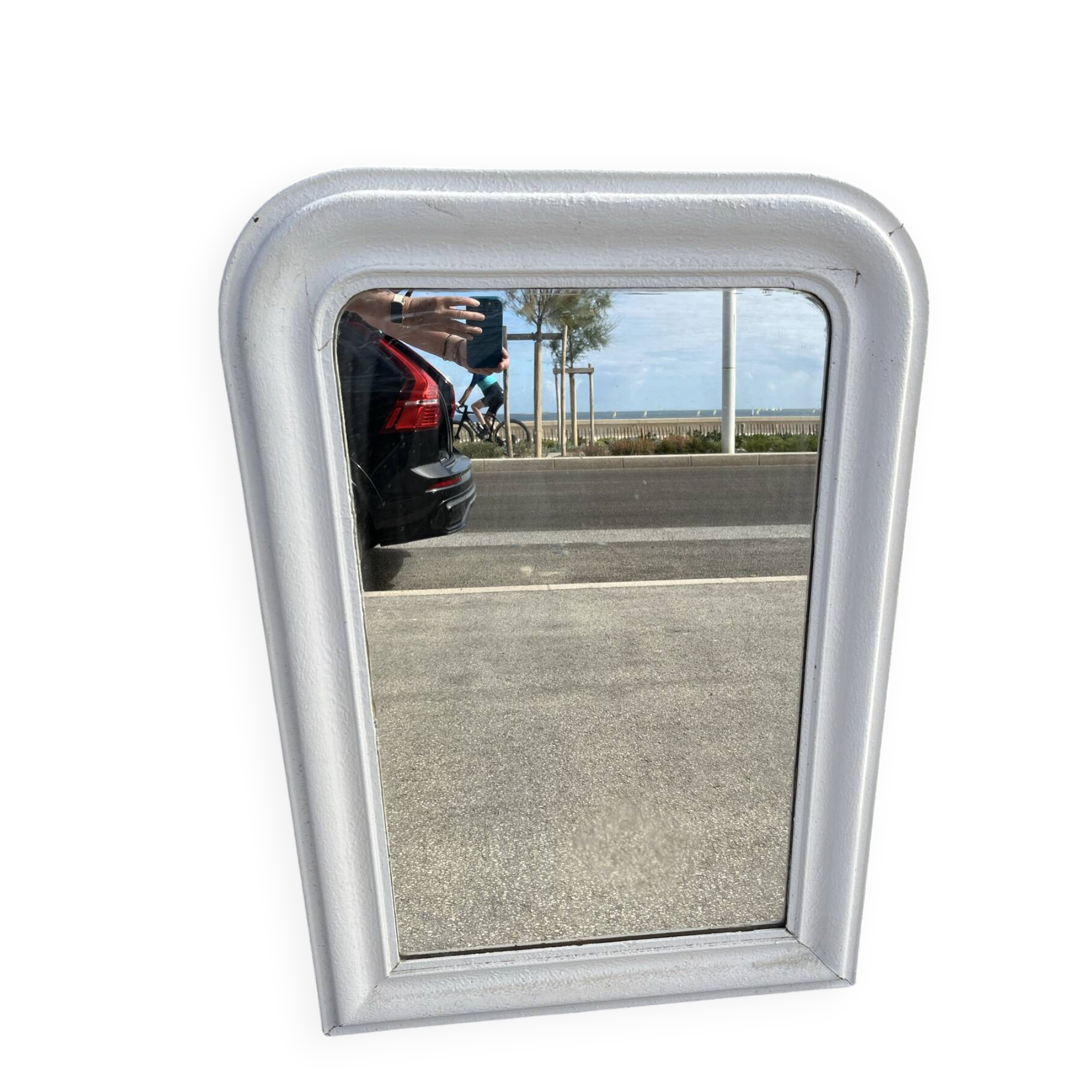 Large white mirror from the early century.