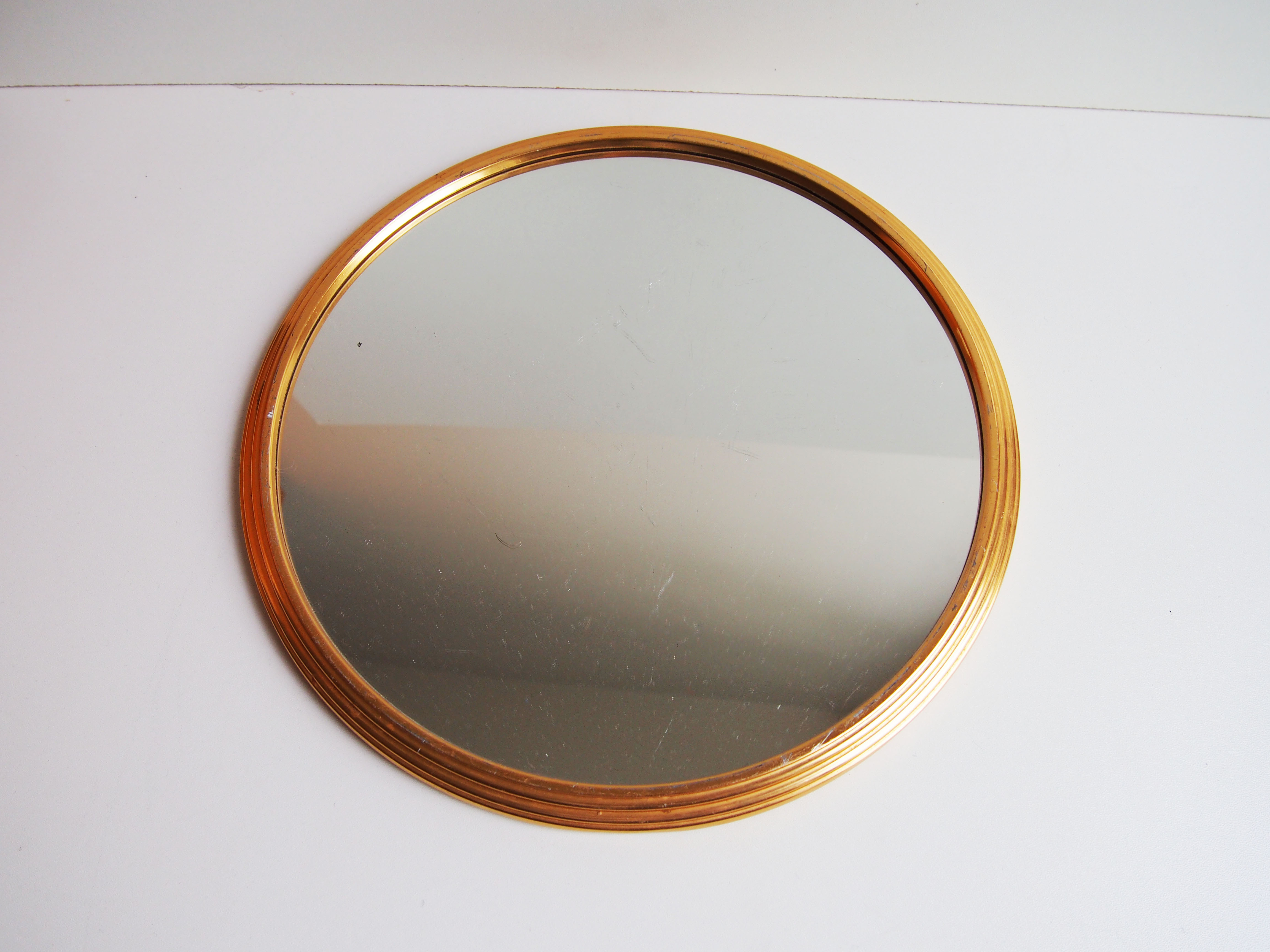 Golden round mirror tray