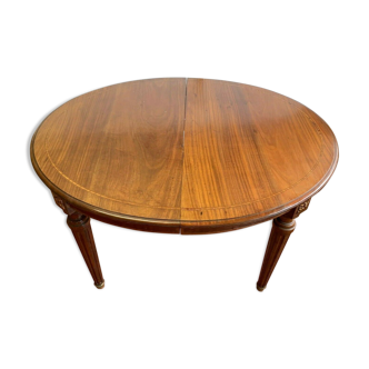 Louis XVI style table in mahogany and light wood 20th century