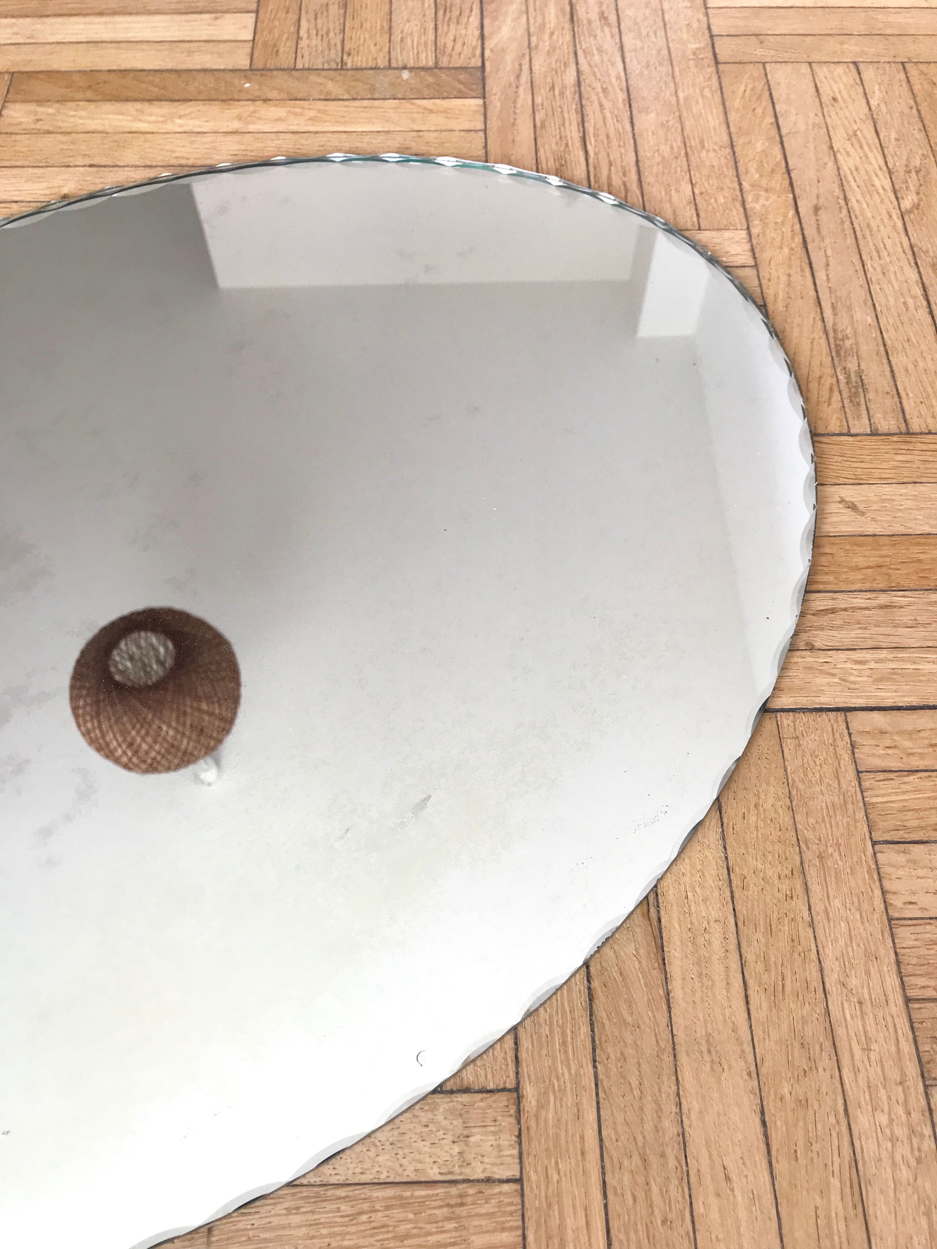 Oval mirror bevelled with removable metal media 43x60cm