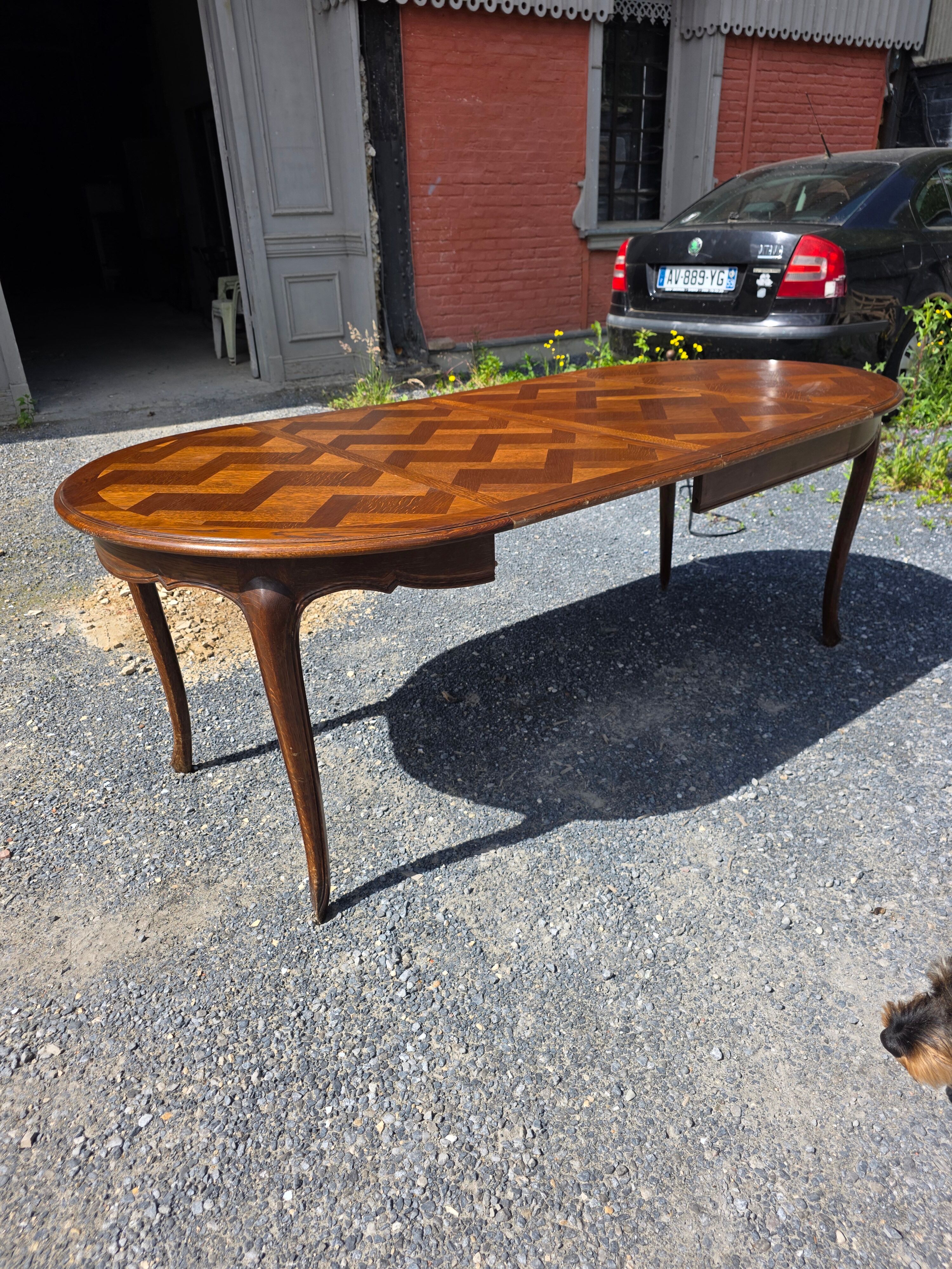 Extendable table in Louis XV style in oak (2 extensions)