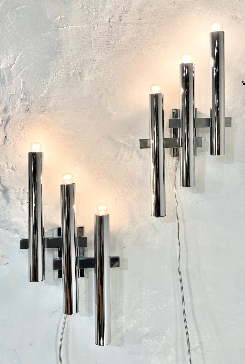 Pair of chrome wall lights by Gaetano Sciolari, 1970's