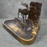 Metal table lamp with a deer on the front