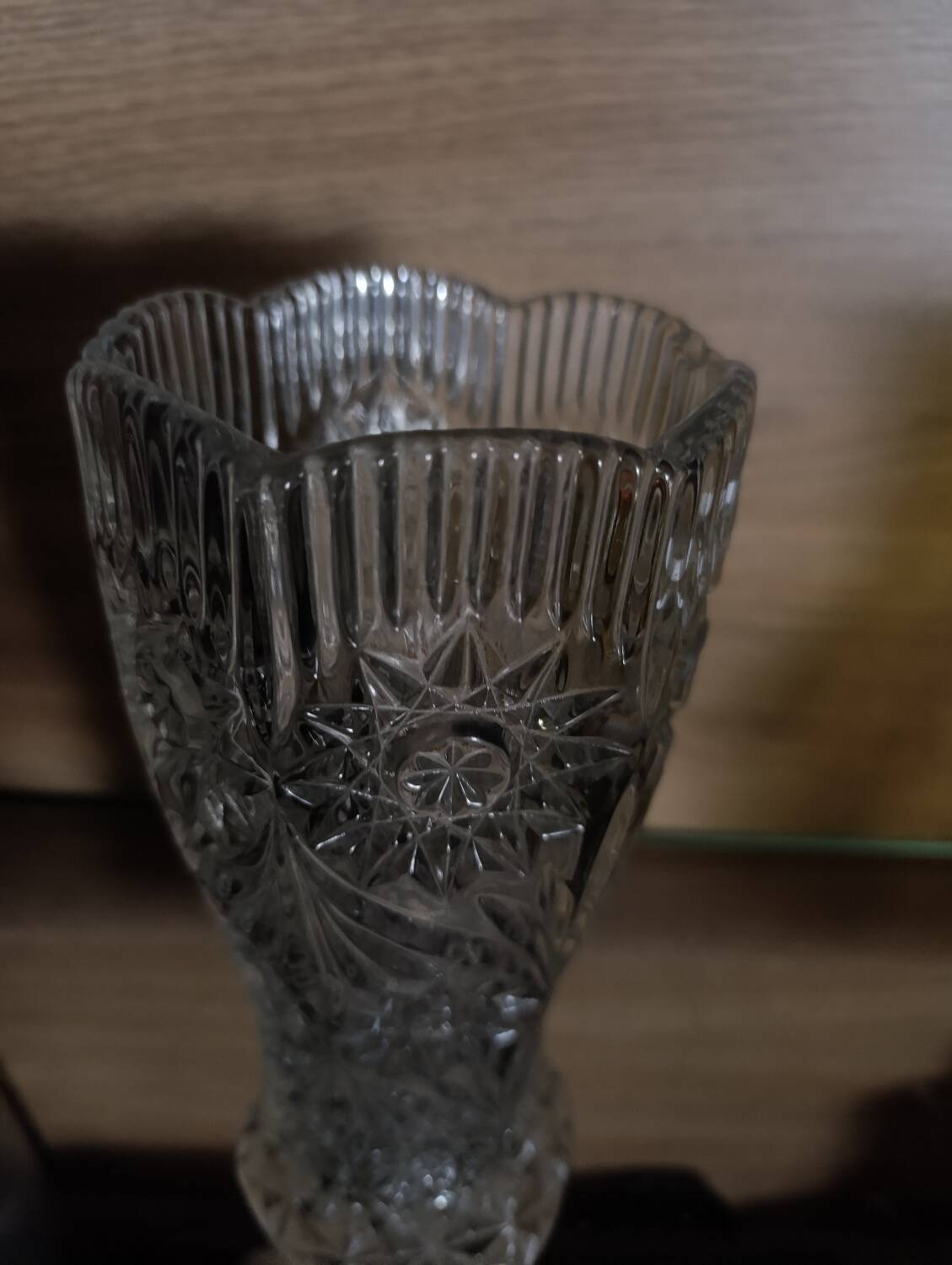 Vintage pressed glass vase, a decorative and elegant piece.