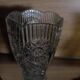 Vintage pressed glass vase, a decorative and elegant piece.