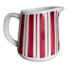 Old striped milk jug