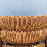 Vintage armchair in straw and brutalist wood