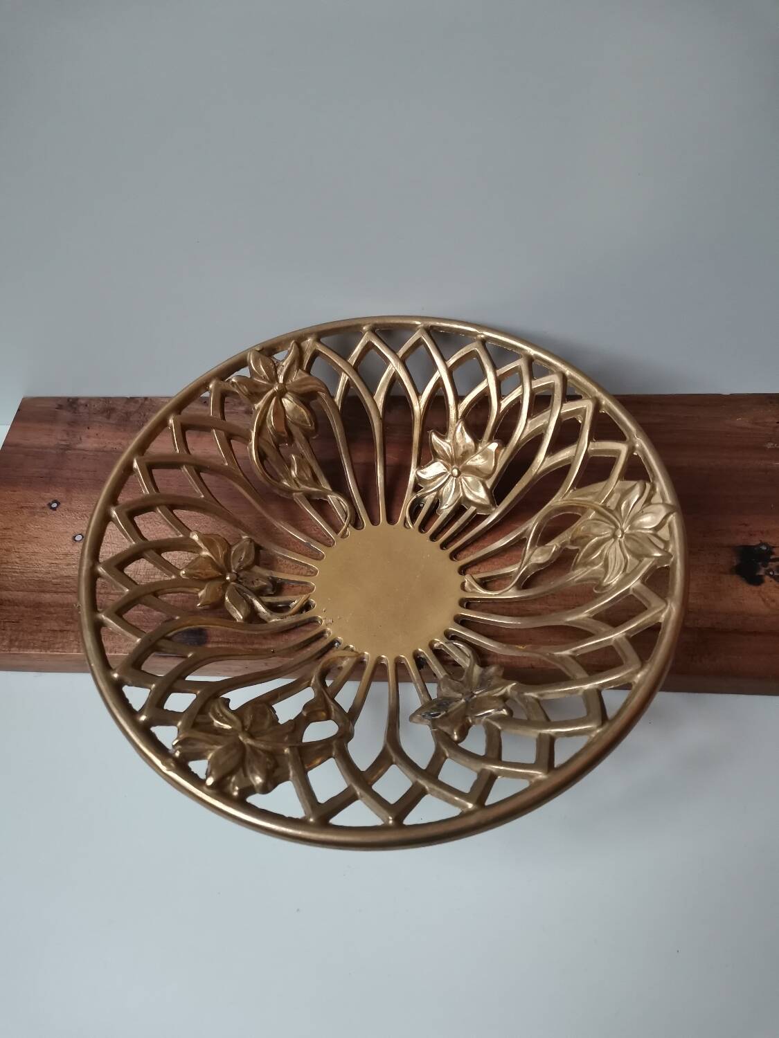 Large vintage cast brass fruit bowl with flower pattern