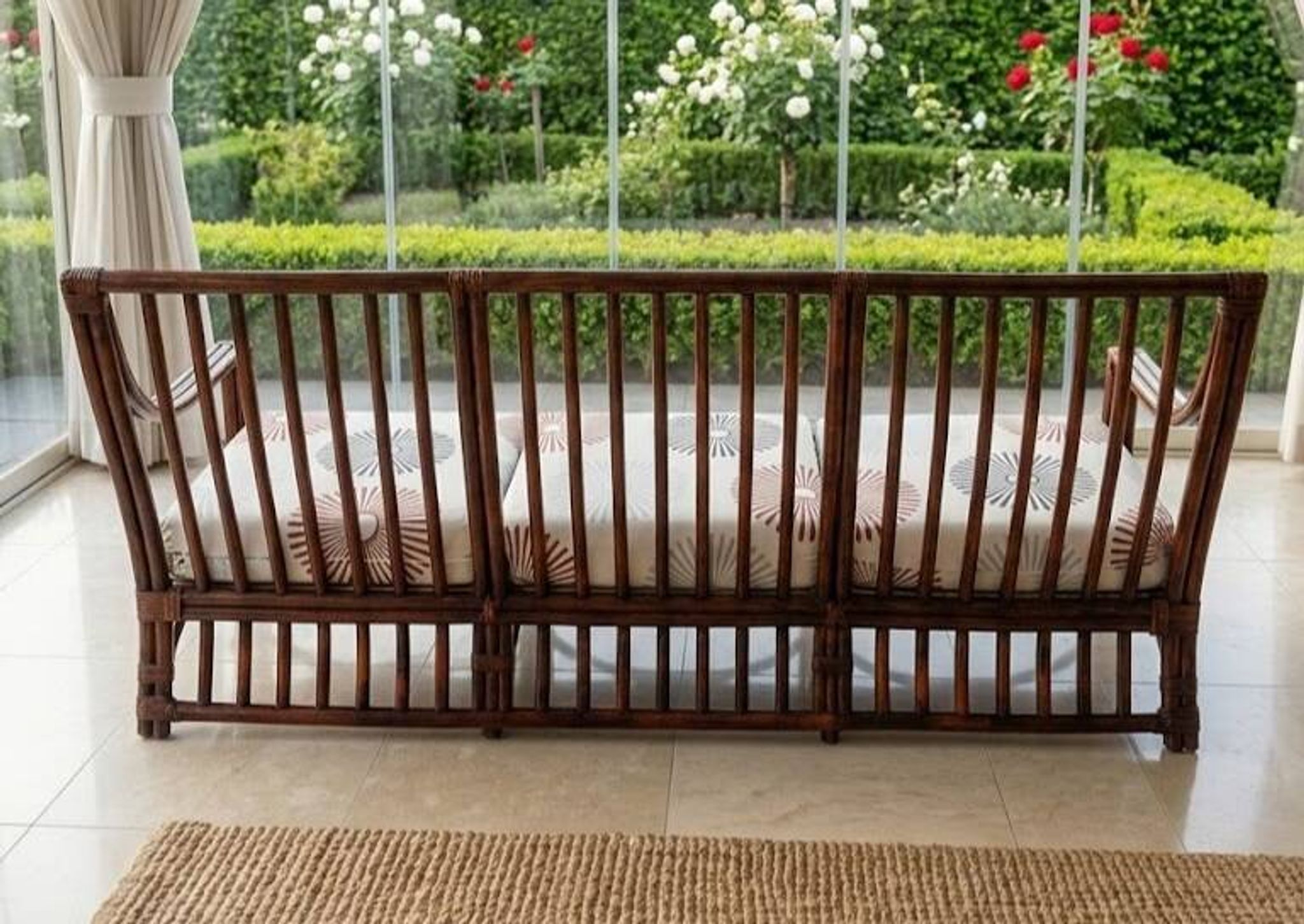 Vintage salon Maison Maugrion in rattan with leather and feather finishes.