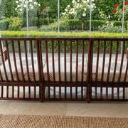 Vintage salon Maison Maugrion in rattan with leather and feather finishes.