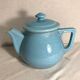Cracked blue ceramic vintage teapot