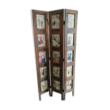 Wooden screen with vintage haute couture images or for photos