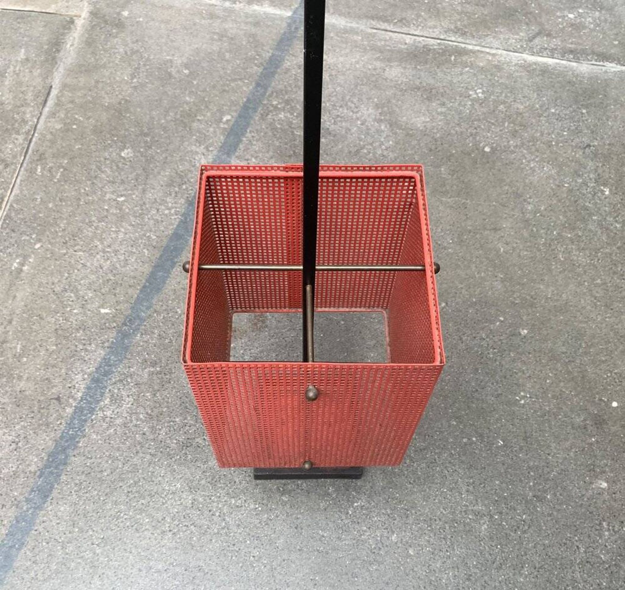 Minimalist perforated steel umbrella stand, 1960s