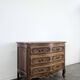 Commode néo rustique galbée richement sculptée