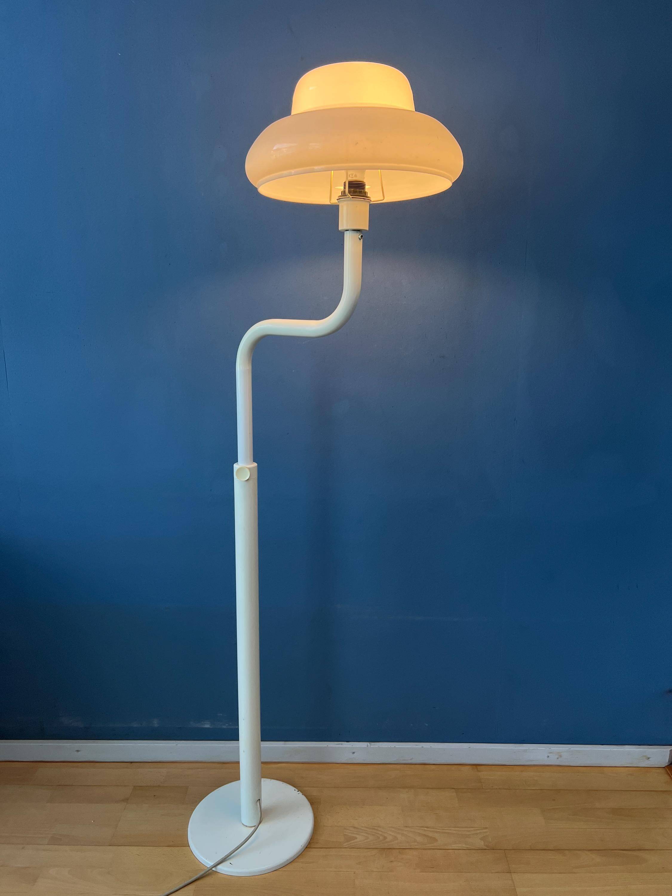 Mid-century mushroom floor lamp with a white plexiglass shade.