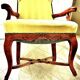 Wingback armchair in walnut in the French Regency style with stretcher in