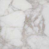 Tulip dining table in marble by Eero Saarinen for Knoll International.