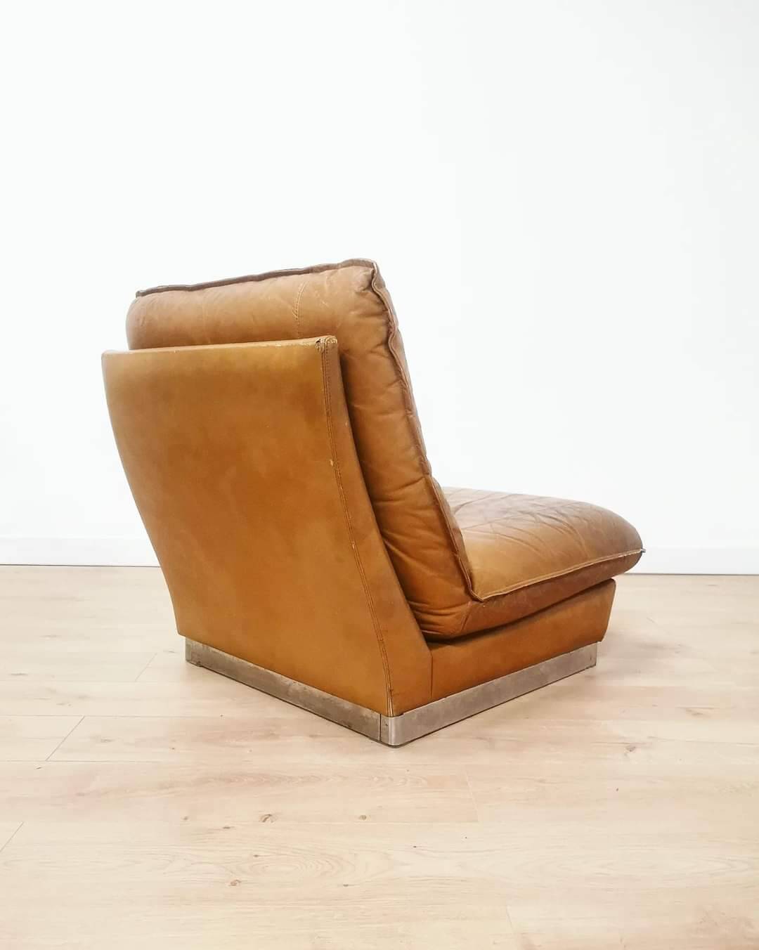 70s lounge chair in camel leather