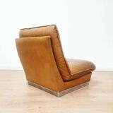 70s lounge chair in camel leather