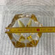 Vintage empty pocket ashtray in yellow chiseled glass or crystal