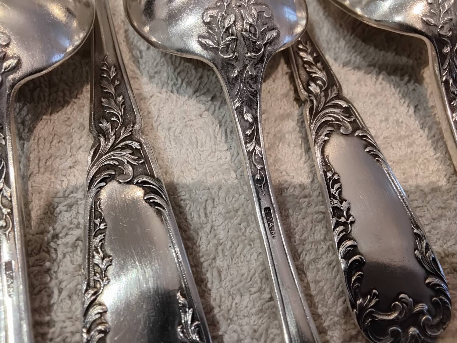 12 silver-plated metal dessert spoons, silversmith SFAM, rocaille design, 19.1 cm.