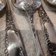 12 silver-plated metal dessert spoons, silversmith SFAM, rocaille design, 19.1 cm.