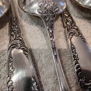 12 silver-plated metal dessert spoons, silversmith SFAM, rocaille design, 19.1 cm.