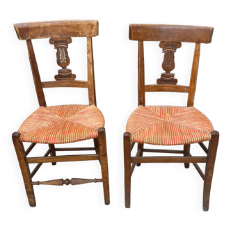 Pair of straw seated chairs