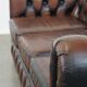 Classic English Chesterfield 2.5 seater sofa in brown cowhide