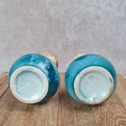Pair of small antique bud vases numbered 396.