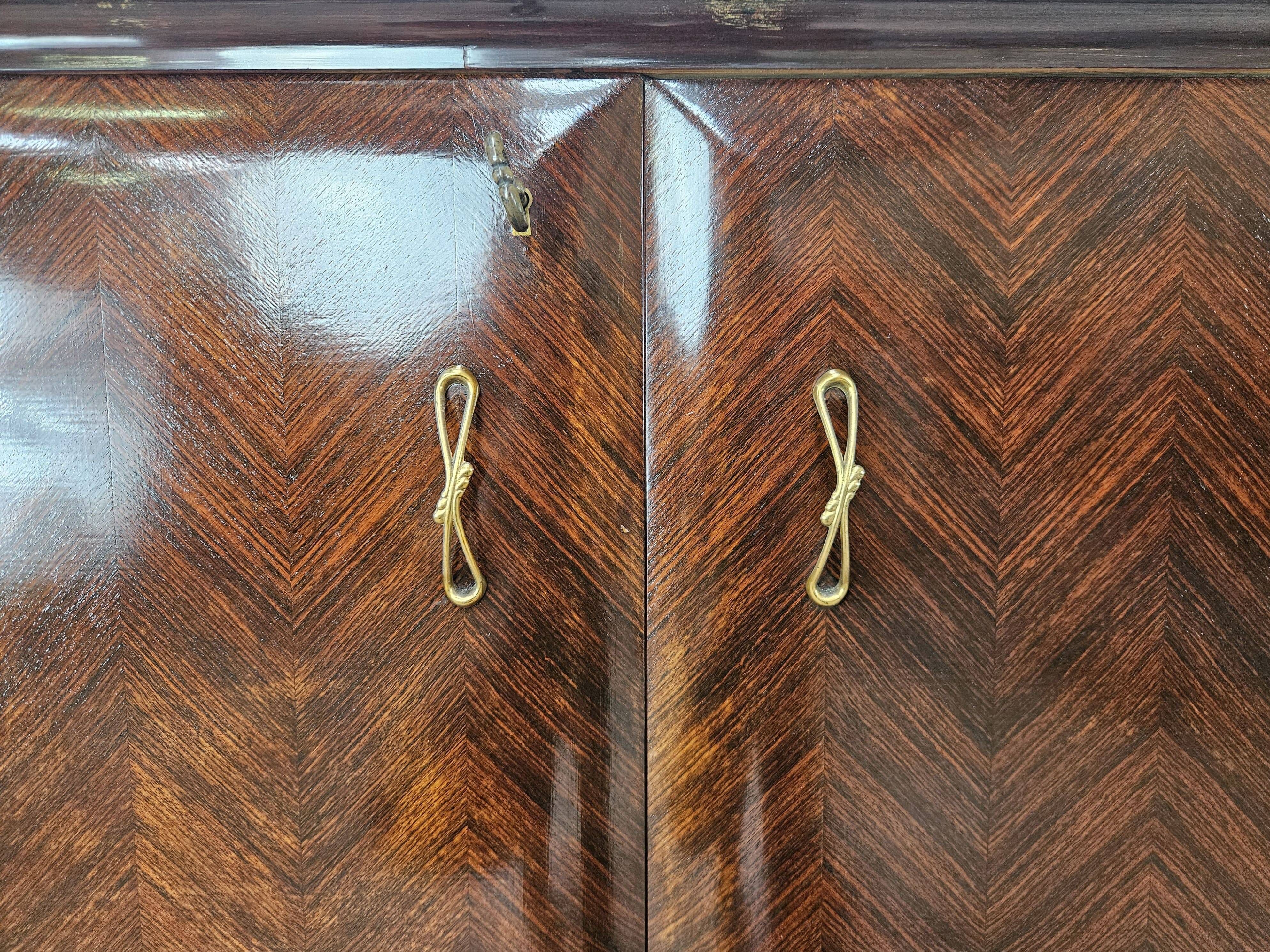 Mahogany sideboard with a glass top, 1960