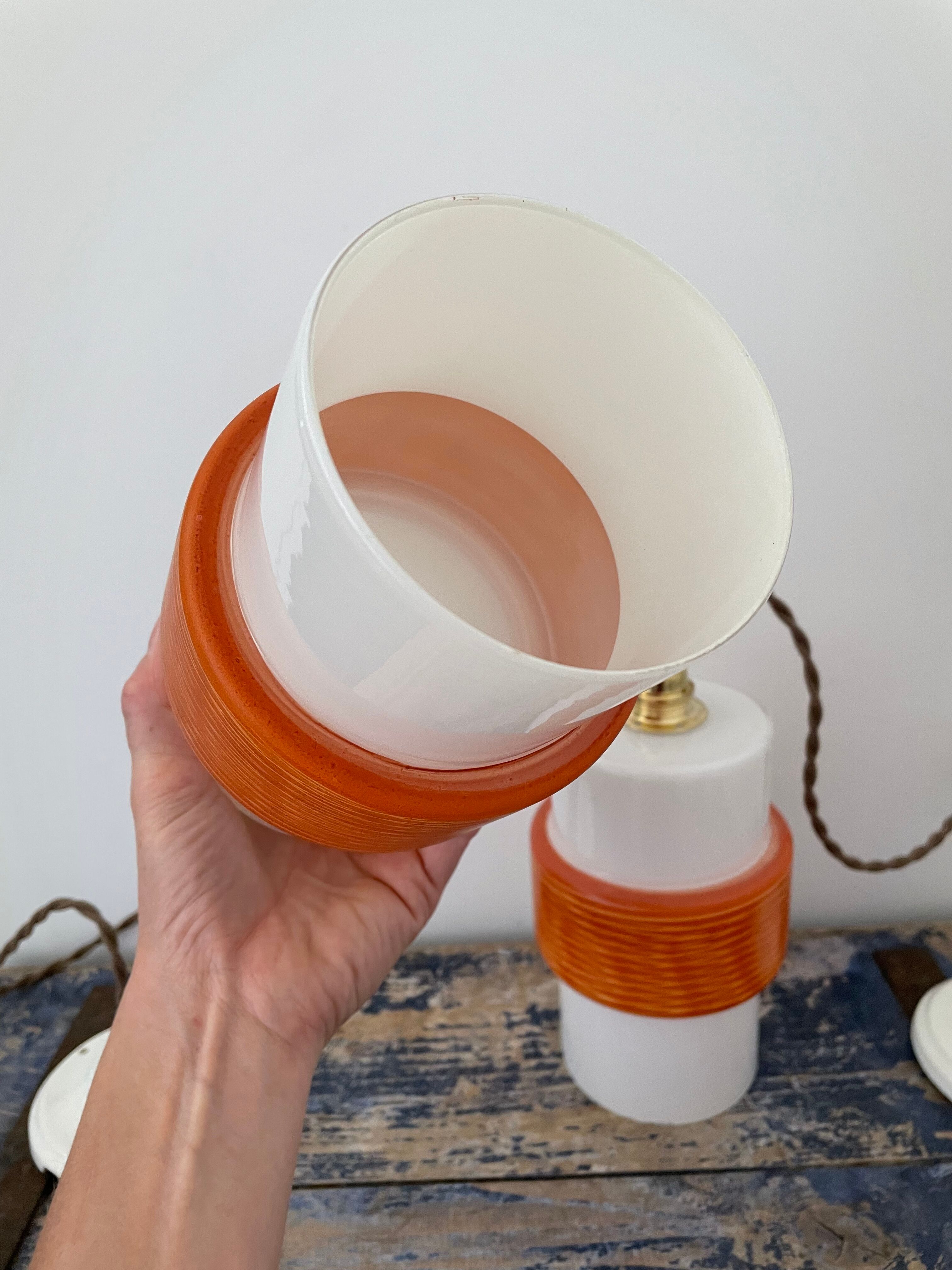 Pair of vintage suspensions electrified to nine