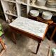 Desk, dark wood and marble side table