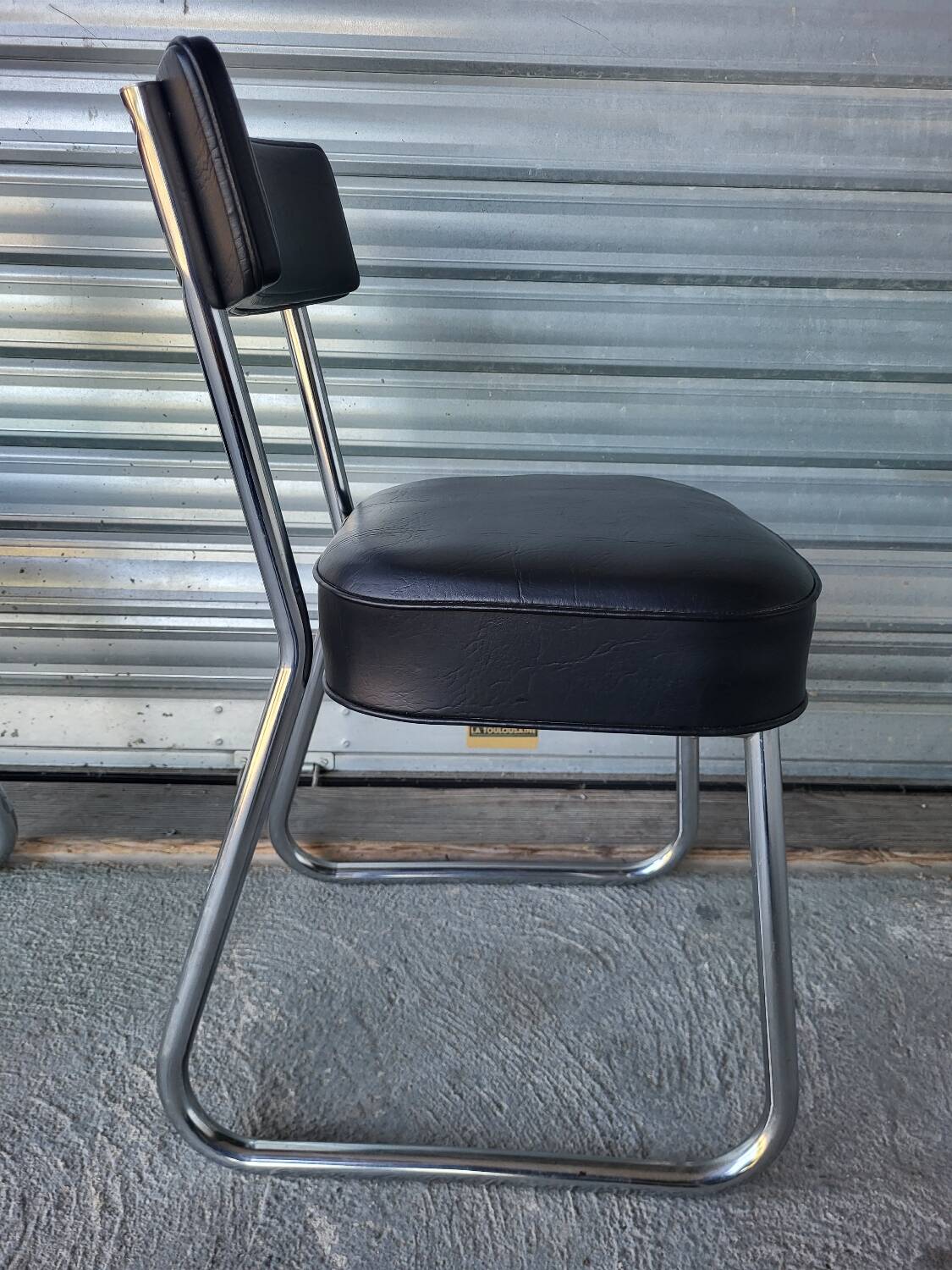 Pair of vintage black and chrome leatherette office chairs in very good condition