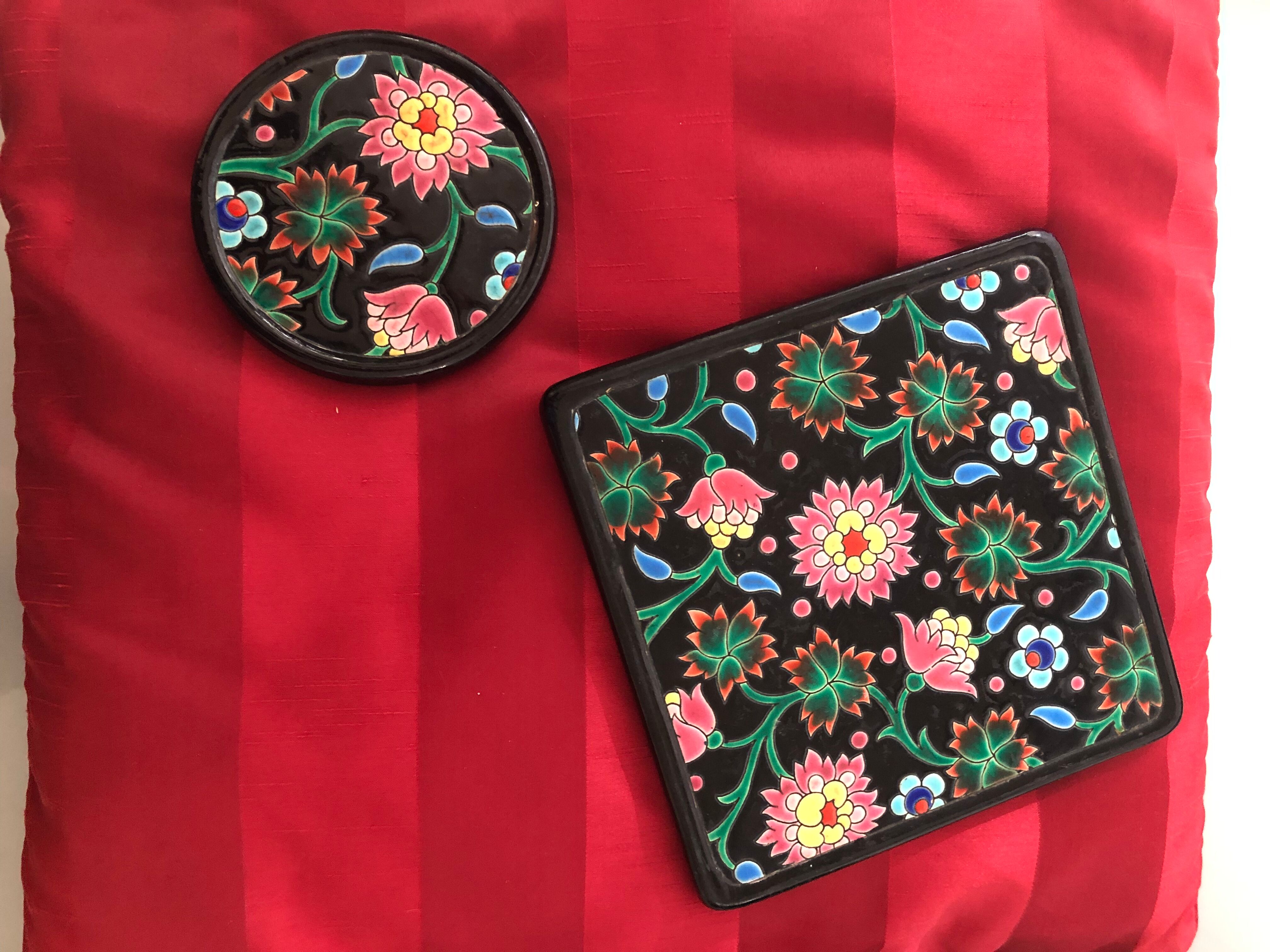 Underside and bottle made of Longwy enamels