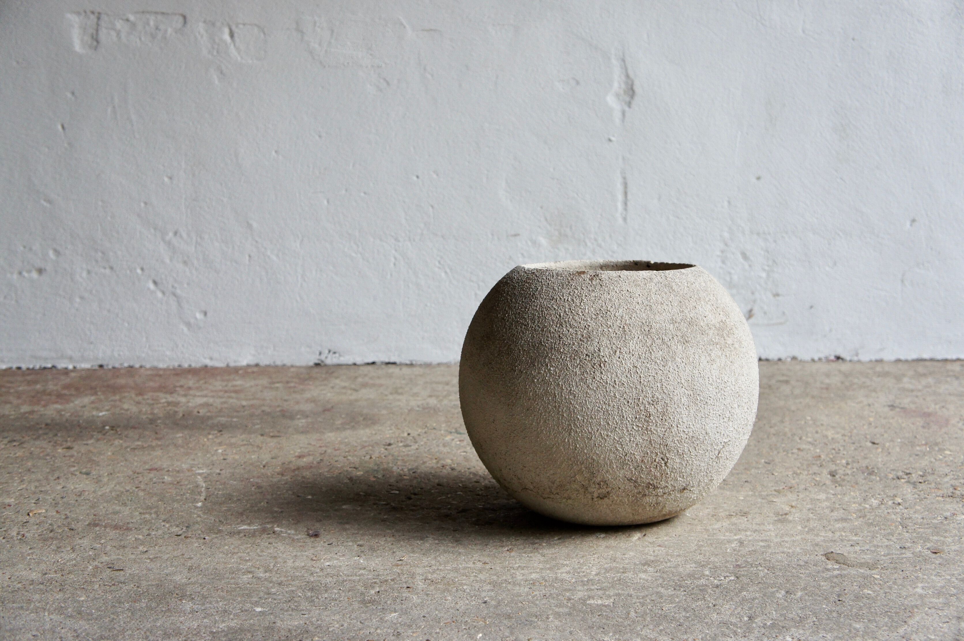 Spherical concrete planter