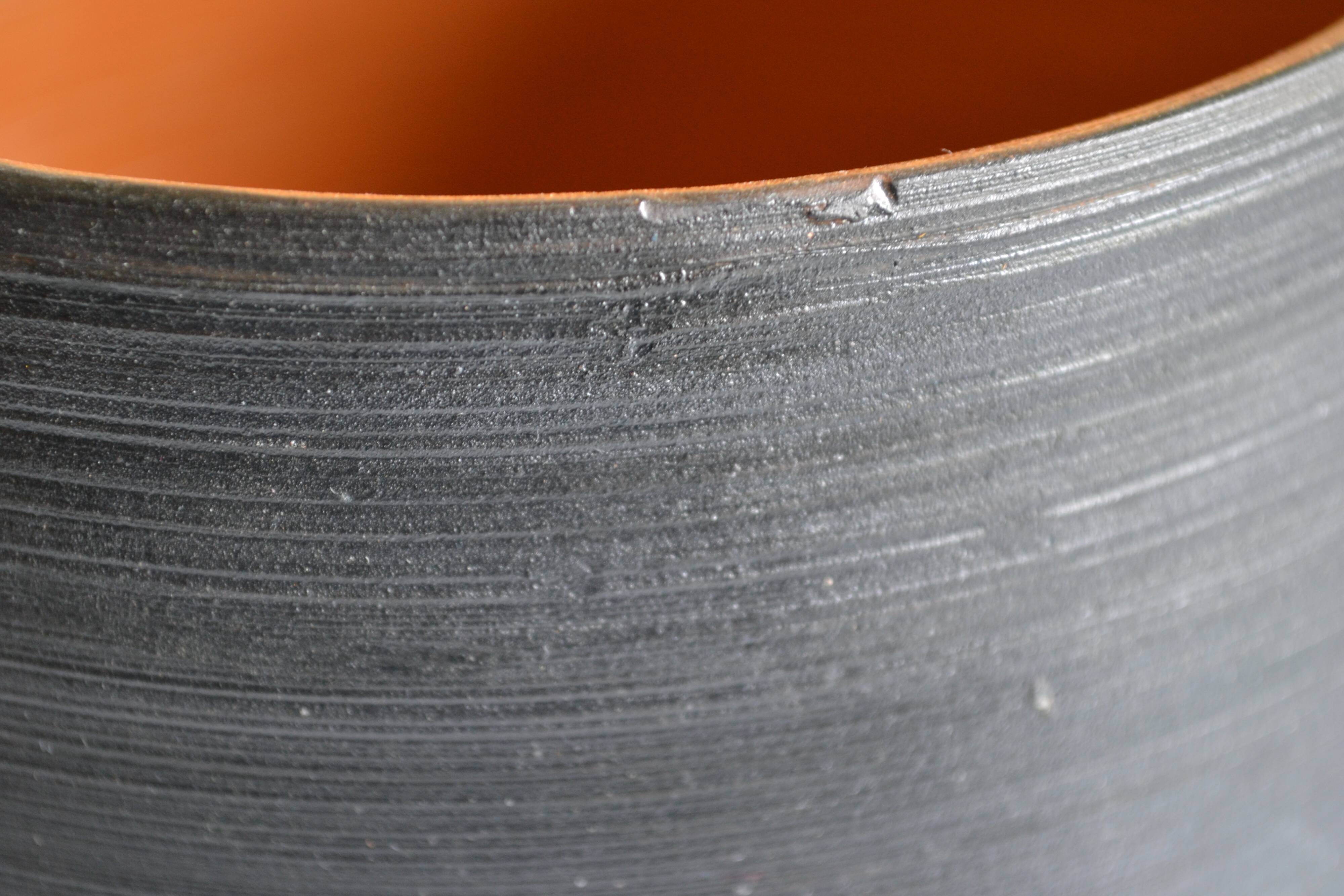 Ceramic cache pot or pocket emptying dish with a signature fish to identify.