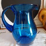 Blue carafe in bubbled blown glass similar to Biot glassware