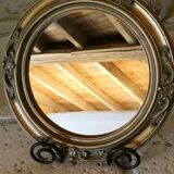 Round golden mirror