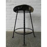 Vintage stool lined with cowhide