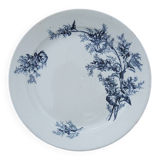 Ancien plat en terre de fer décor floral bleu