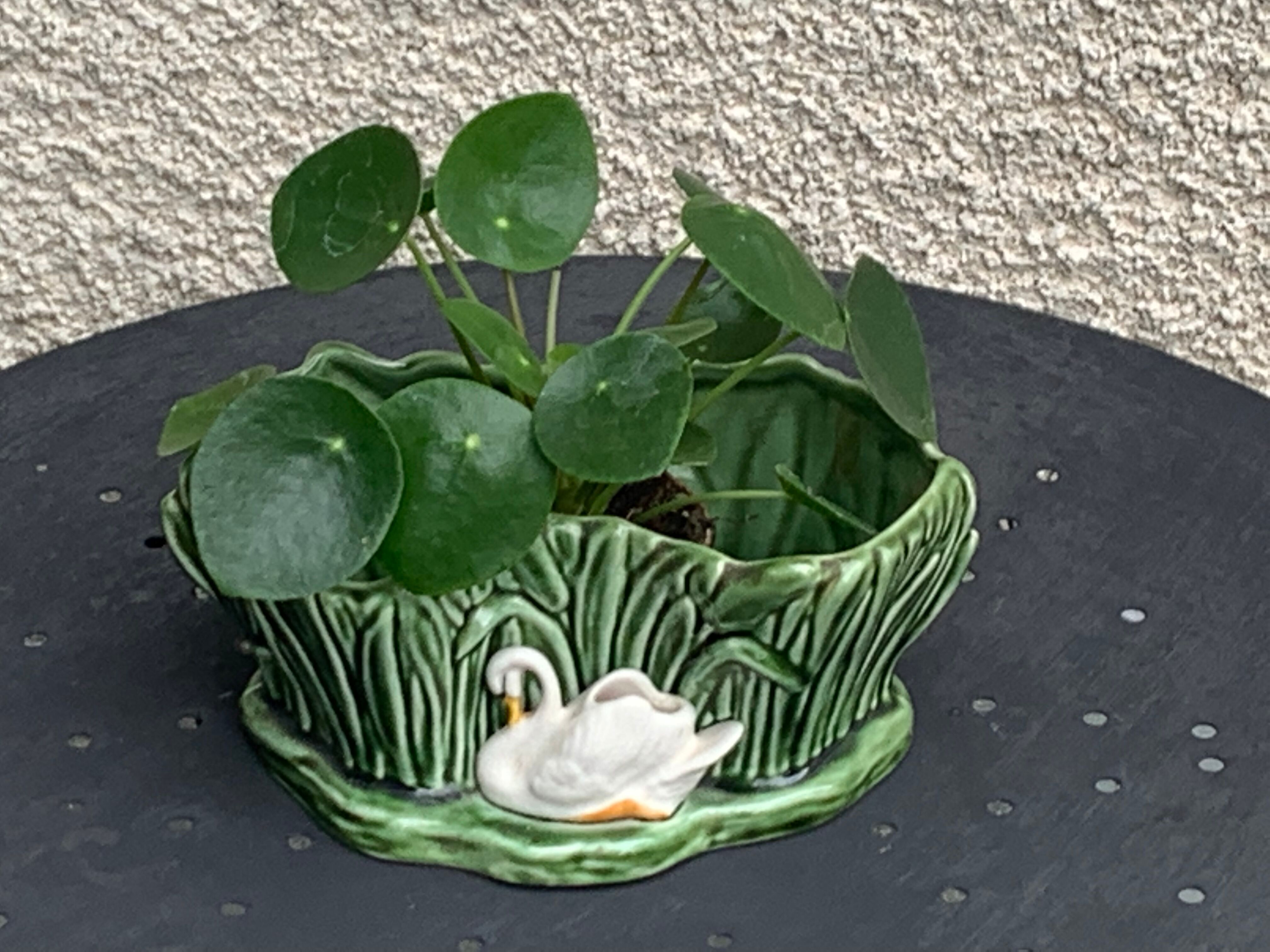 Pot cover in ceramic slurry glazed green pattern foliage and swan made in england numbered
