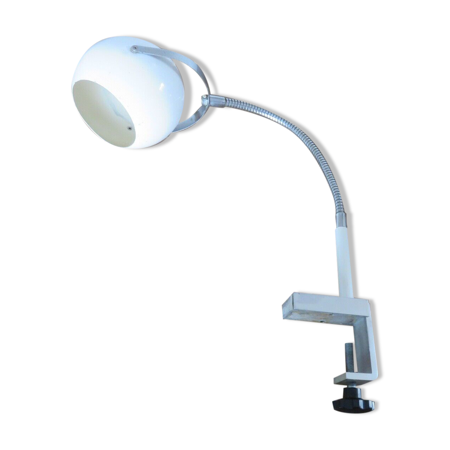 Eye ball lamp stapled on a chrome hose 70s