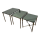 Nested tables in gilded brass in the style of Maison Charles.