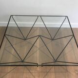 Black lacquered metal coffee table with a clear glass top. Attributed to Paolo Piva.