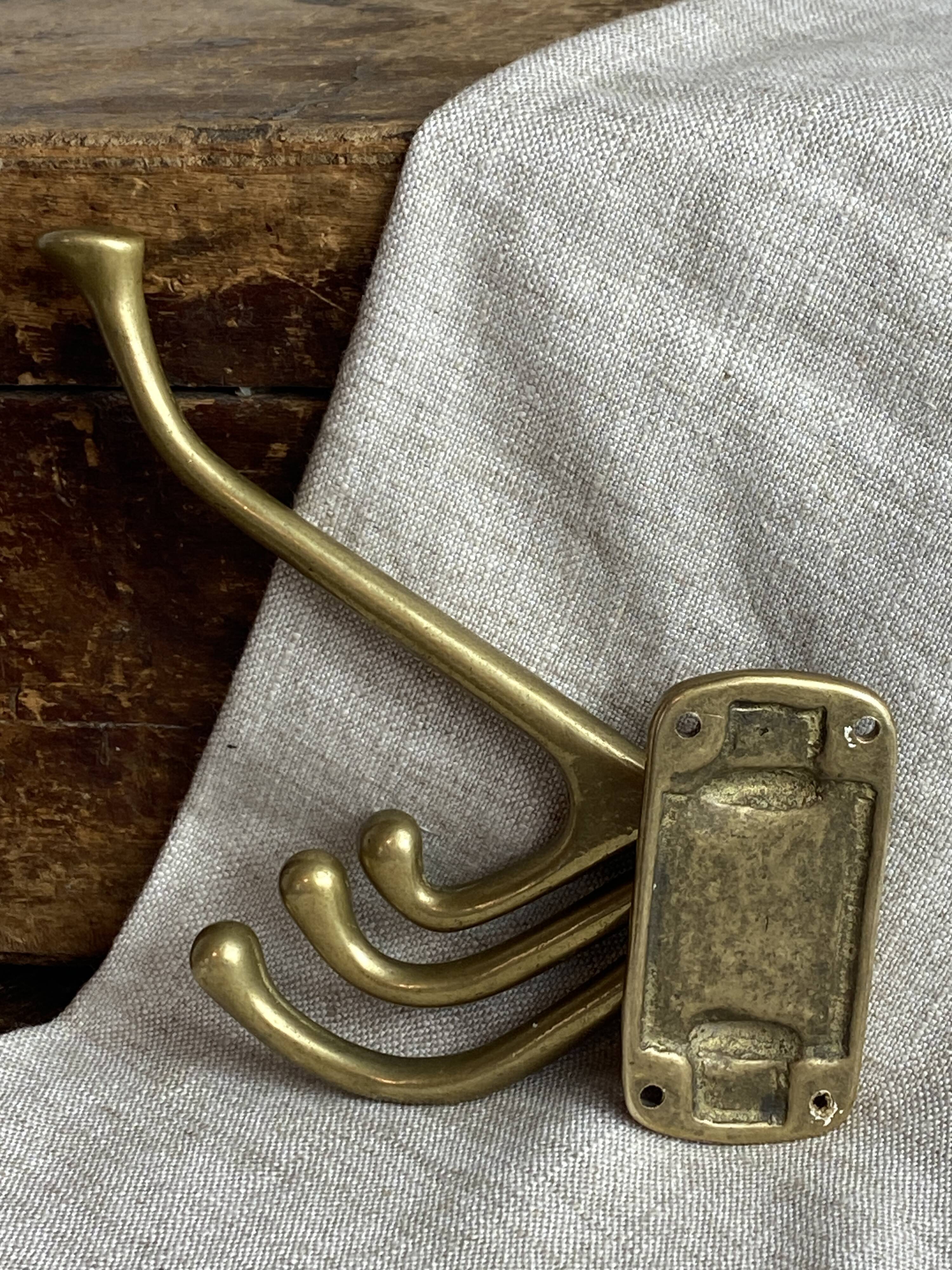 Adjustable nautical coat hook in solid brass