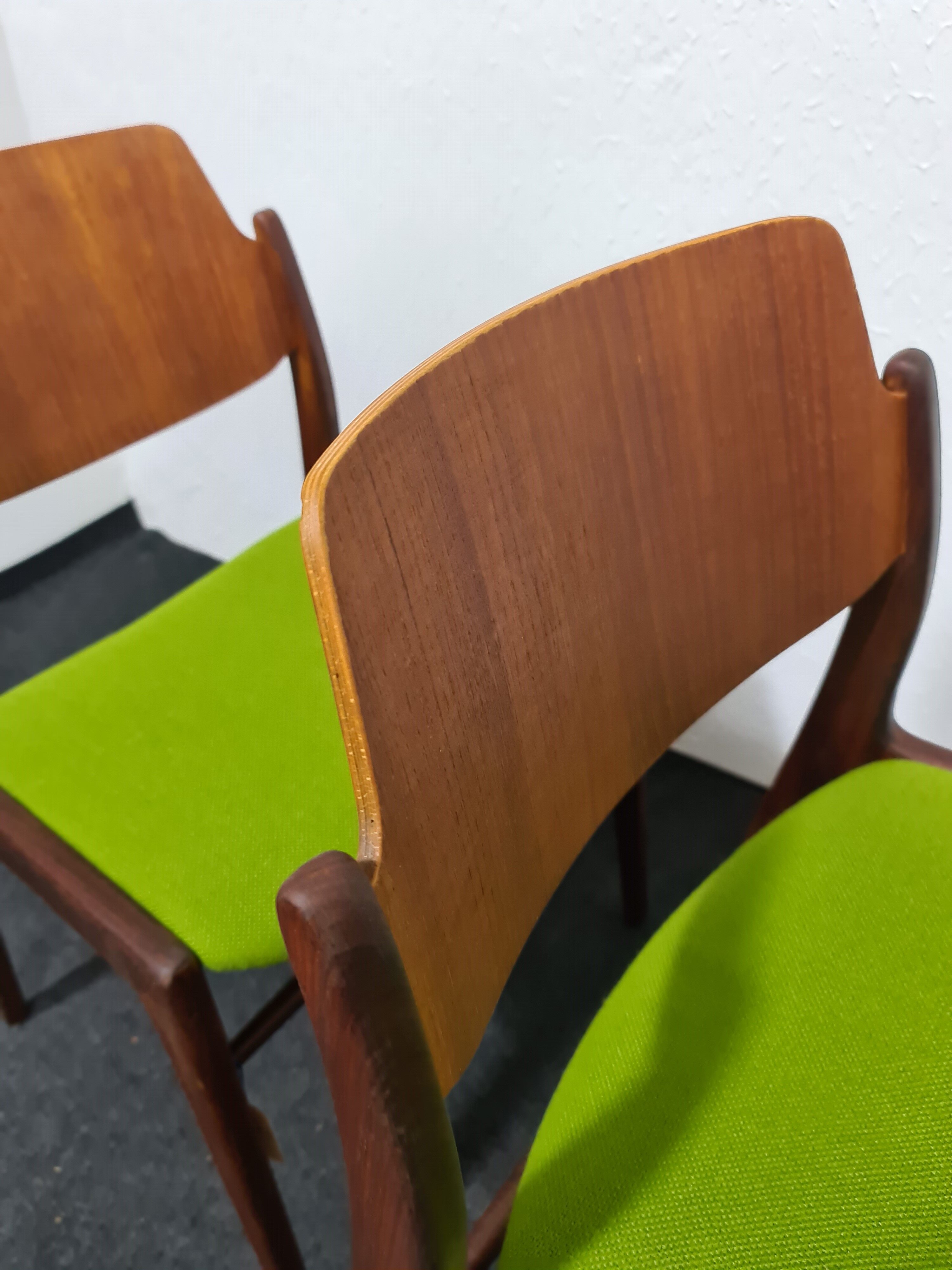 Two vintage teak dining chairs