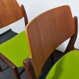 Two vintage teak dining chairs