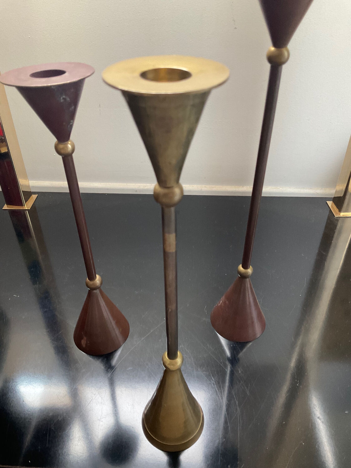 Trio of vintage brass and copper candle holders