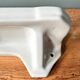 Large Art Deco wall shelf in white porcelain